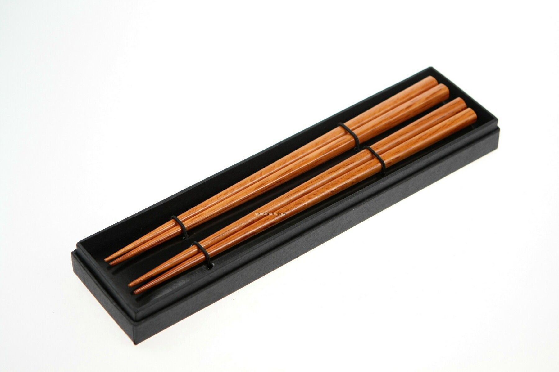 Two Pairs Of Wooden Brown Chopsticks In Black Cardboard Box