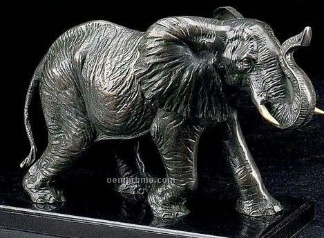 Brass Elephant Sculpture On Wood