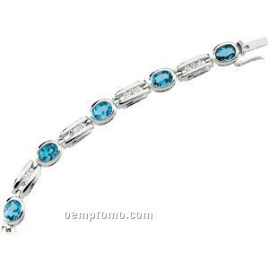 Sterling Silver Genuine Swiss Blue Topaz And Cz Bracelet